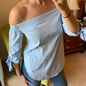 Baby blue strapless top with tie sleeves